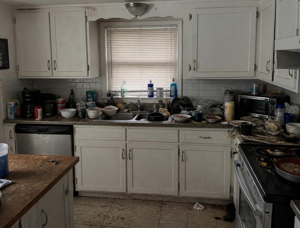 Sample photo of a cluttered, untidy kitchen before cleaning